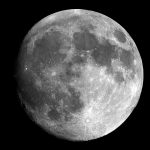 Captivating black and white image of the full moon showcasing intricate lunar details.